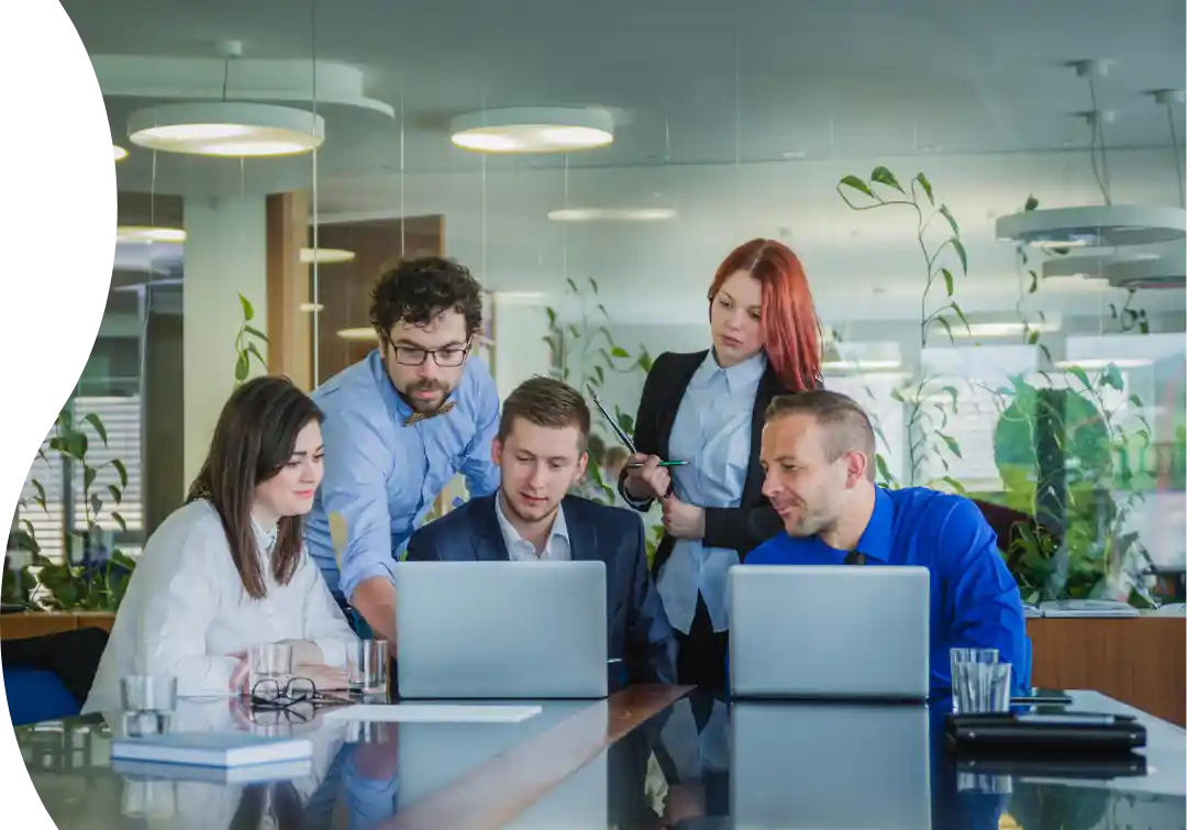 A team productively collaborates in a modern office, enjoying Ultranet Internet's seamless, fast connectivity for efficient, uninterrupted work and real-time sharing.